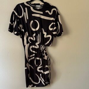 Elegant Black and Cream Asymmetrical Dress